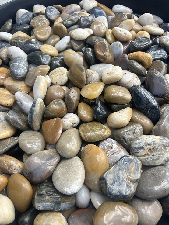 Polished mixed stone close-up texture